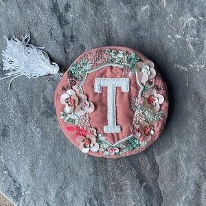 Monograms “T” Crest Pouch